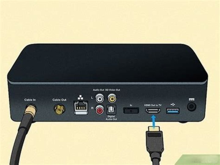 How do I turn up the volume on my Comcast box?